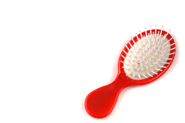 Elegant red hair comb brush with handle, isolated on transparent or white background. Front view. - Photo, Image