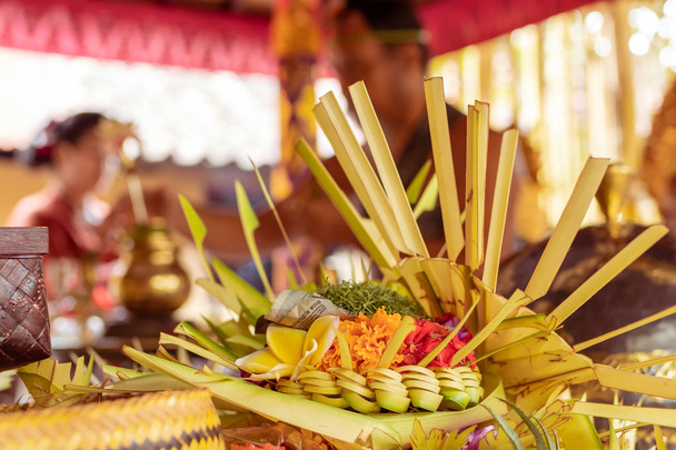 Traditional balinese offerings to gods. Tropical island of Bali, Indonesia. - Photo, Image