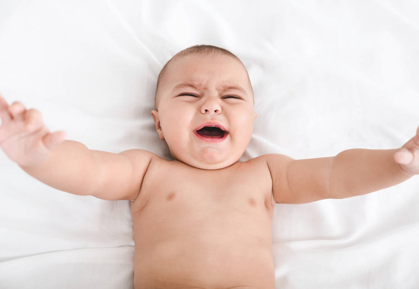 Closeup portrait of newborn crying screaming baby - Photo, Image