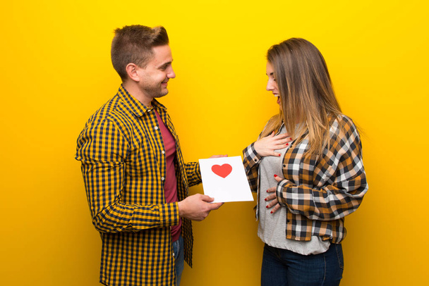 Couple in valentine day with valentines day card - Photo, Image