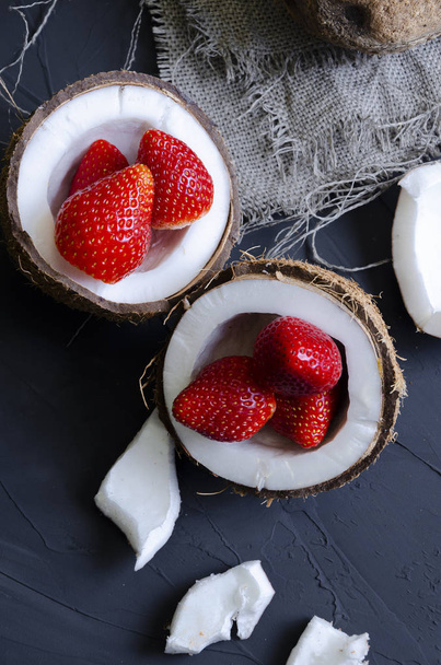 delicate dessert with cream, powdered sugar and berries in coconut - Φωτογραφία, εικόνα