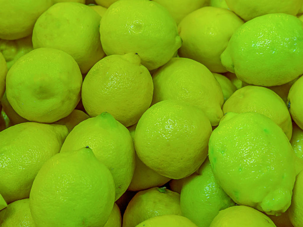 světle zelený tón celé plody citrus lemon hodně pozadí světlé kyselé dezert složkou a Limonádový dort - Fotografie, Obrázek