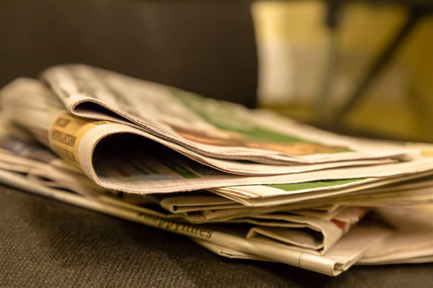 morning press traditional breakfast businessman hot coffee stack of newspapers quotations fresh sports news - Fotoğraf, Görsel