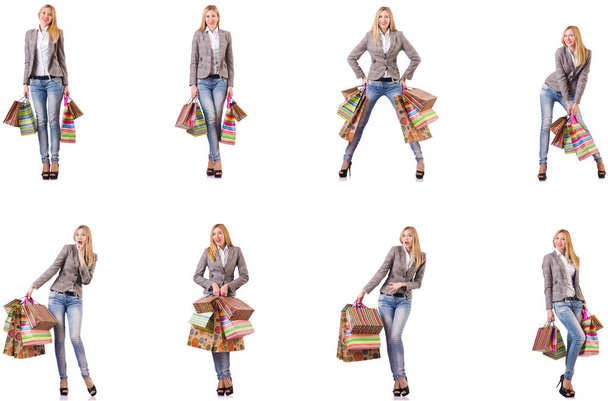 Beautiful woman with shopping bags isolated on white - Foto, Bild