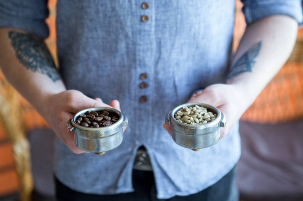 bean coffee and stainless spoon on coffee machine - Zdjęcie, obraz