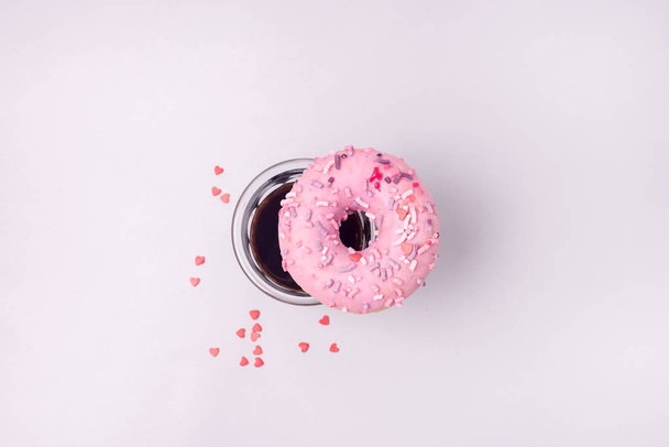 Fesh Pink Donut With Coffee Americano Flat Lay Top View Donut and Coffee - Fotografie, Obrázek