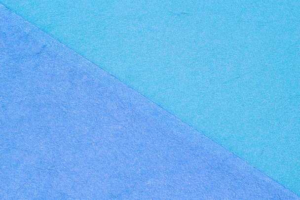 Blauwe speeltuin of sportveld rubber kruimelbekleding grunge achtergrond - Foto, afbeelding