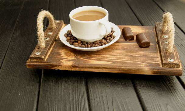 Чёрные кофейные зерна крупным планом
 - Фото, изображение