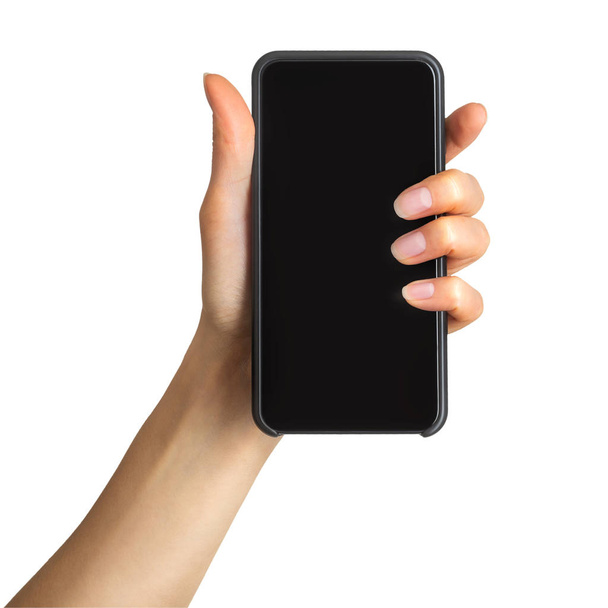 Womens hand showing black smartphone, concept of mobile shopping - Fotografie, Obrázek