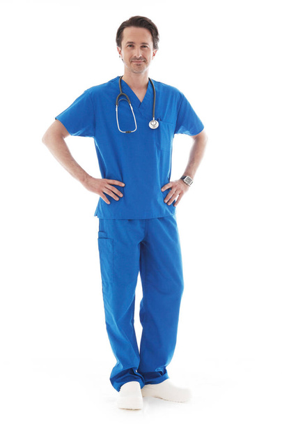 Full length portrait of young doctor in blue uniform isolated on white background  - Fotoğraf, Görsel