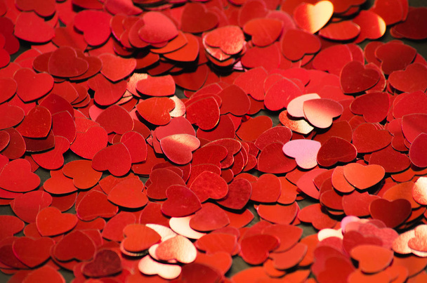 Heap of red glossy hearts romantic abstract background - Фото, зображення