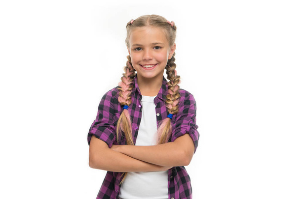 Child little girl colorful braids fashionable hairstyle isolated white. Teenage fashion concept. Fashionable hairstyle. Casual style fashion. Girl confidently crossed arms on chest. Fashion trend - Fotografie, Obrázek