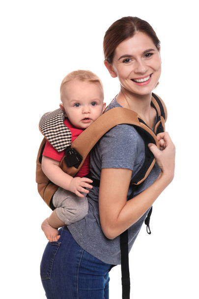 Woman with her son in baby carrier on white background - Fotoğraf, Görsel