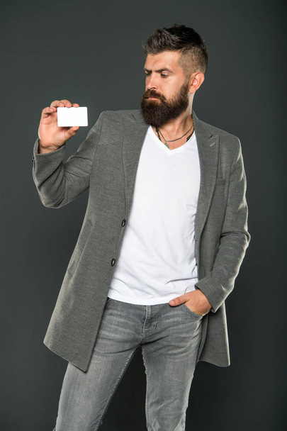 Plastic bank card. Easy money credit. Which bank card easy to get. Easy shopping. Credit card gives you freedom and confidence. Man bearded hipster hold plastic blank card. Banking and credit concept - Foto, Imagem
