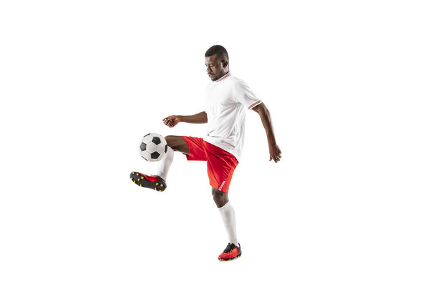 Professional african football soccer player isolated on white background - Foto, imagen