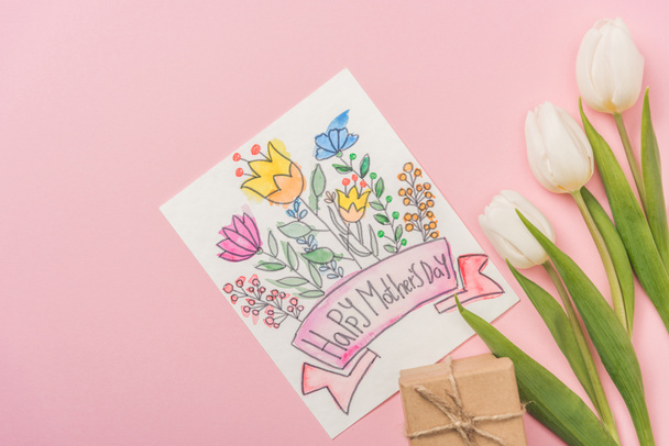 happy mothers day greeting card, gift box and white tulips on pink background - Photo, Image