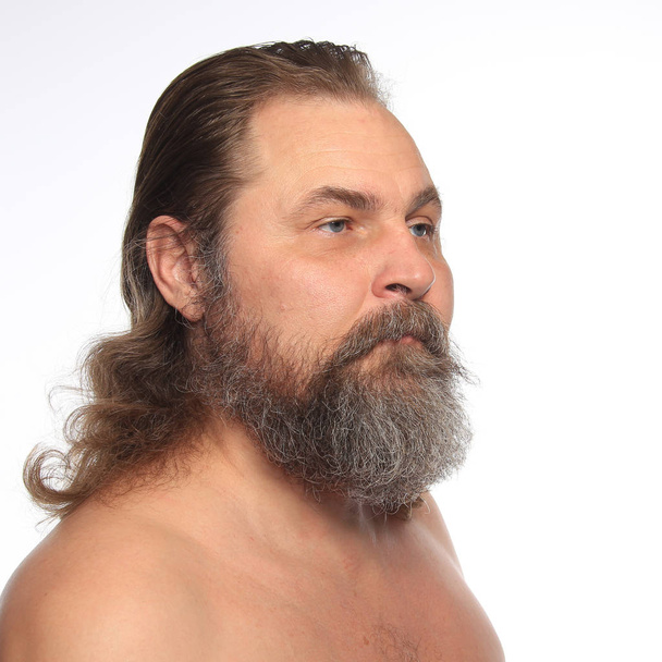 close-up portrait of a charismatic man with a beard and mustache Studio  - Foto, Bild