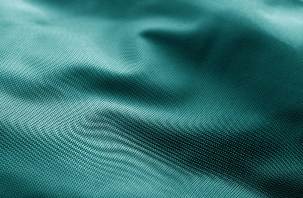 Textile texture with blur effect in cyan color. Abstract background and texture for design. - Photo, Image
