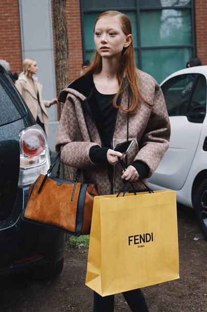 Milan, Italy - February 22, 2018: Fashion model posing after Fendi fashion show during Milan Fashion Week. - Foto, afbeelding