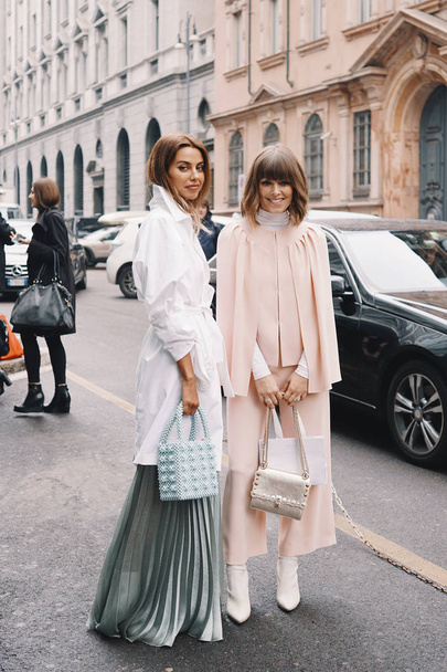 Milan, Italy - February 21, 2018: Models, bloggers and influencers with fashionable and stylish looking during Milan Fashion Week. - Foto, imagen