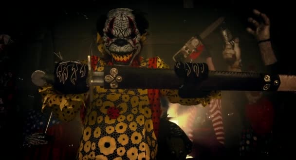 clown moving with sword, scary clowns Halloween party concept - Felvétel, videó