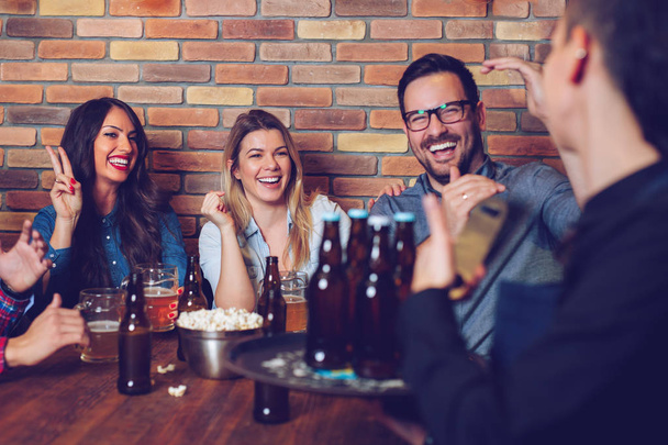 Happy friends group drinking beer at brewery bar restaurant - Image - 写真・画像