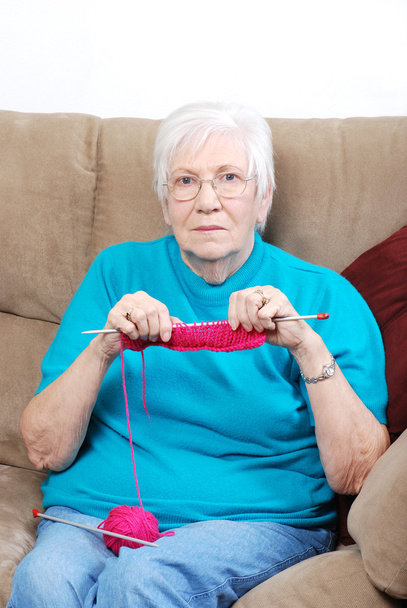 Senior woman counting knitting stitches - Zdjęcie, obraz