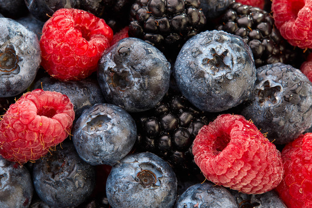 Set fresh berries: blueberry, blackberry, raspberry  close up macro. - Фото, изображение