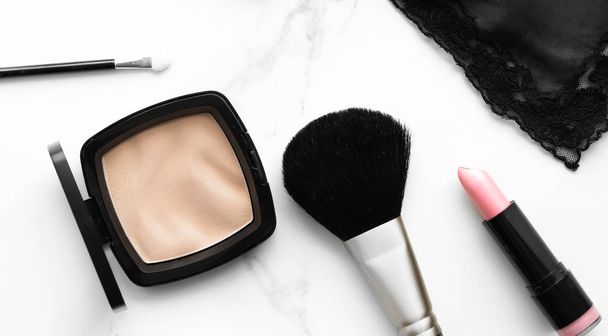 Make-up and cosmetics on marble, flatlay - modern feminine lifestyle, vlog background and styled stock concept. Beauty inspiration in a fashion blog - Photo, Image