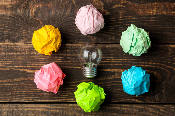 Concept creative idea. concept of creative idea. Bulbs of crumpled paper and light bulb. metaphor, inspiration. - Photo, Image