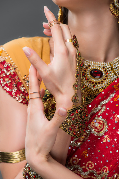 cropped view of indian woman gesturing isolated on grey  - Fotografie, Obrázek