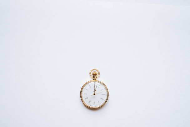 close up of vintage golden clock isolated on white background - Photo, Image