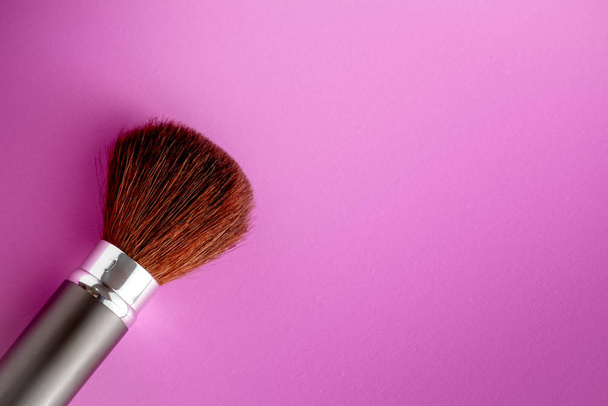 Makeup brush on Pink Pastel paper texture background. Pastel color , Minimal and Valentine concept. Copy space - Fotografie, Obrázek
