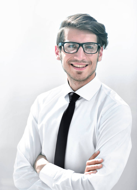 successful young businessman on a bright background - Fotoğraf, Görsel