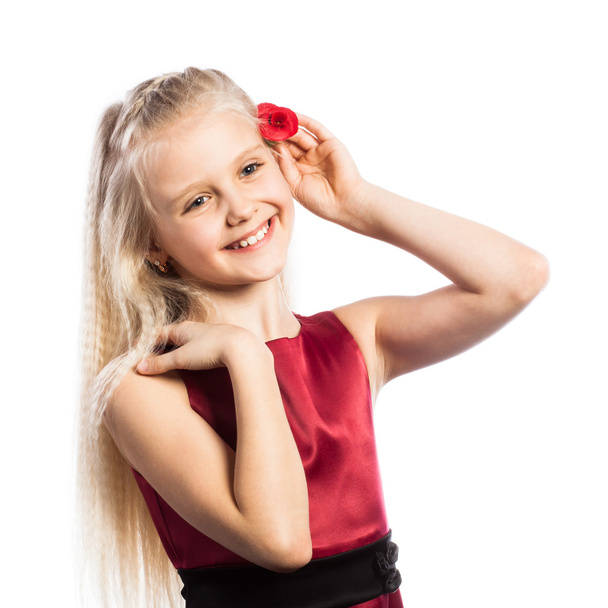 Beautiful blonde girl with rose in hair - Valokuva, kuva