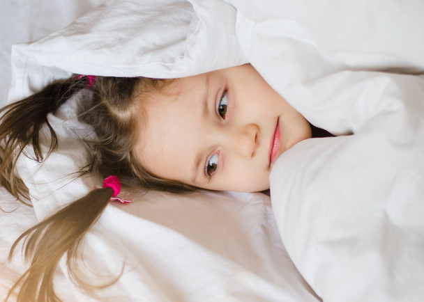 Sleeping child girl in the morning. Close up - Foto, Imagen