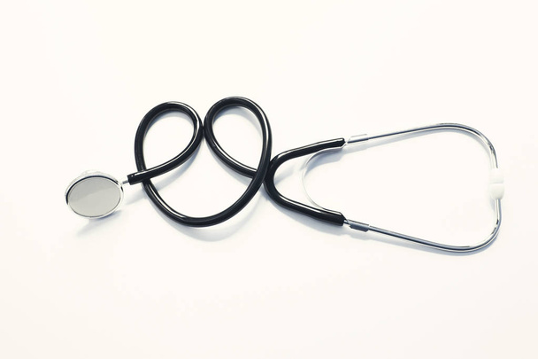 Medical concepts.Stethoscope isolated on blue background - Photo, Image