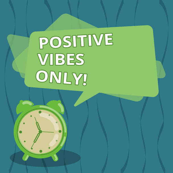 Writing note showing Positive Vibes Only. Business photo showcasing emotional signals demonstrating gives to those around them Blank Rectangular Color Speech Bubble Overlay and Analog Alarm Clock. - Photo, Image