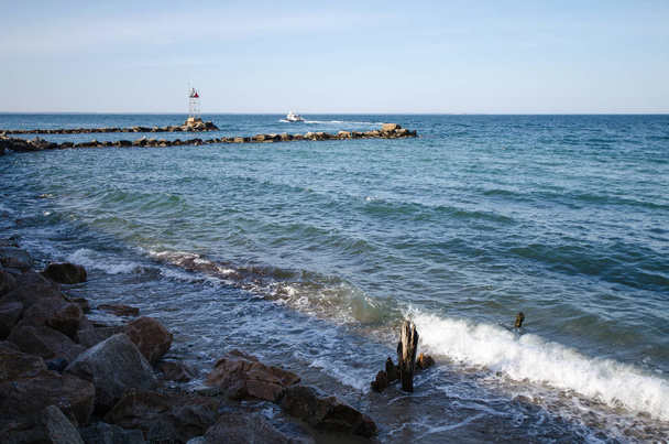 Rocks and breakwaters along the Atlantic ocean on the shore of Marthas Vineyard - Photo, Image