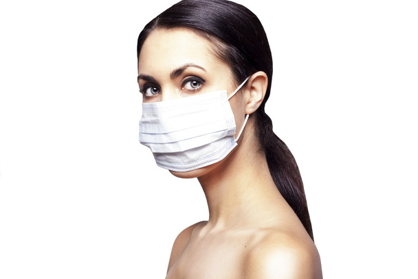 Pretty woman with face mask - 写真・画像