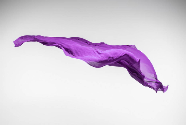 abstract piece of purple fabric flying, art object, design element - Valokuva, kuva
