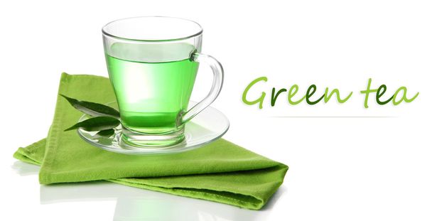 Transparent cup of green tea on napkin, isolated on white - Foto, Bild