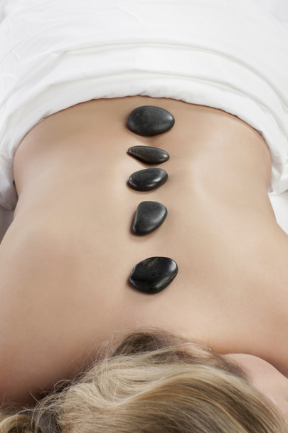 Aromatherapy hot stone massage - Photo, Image