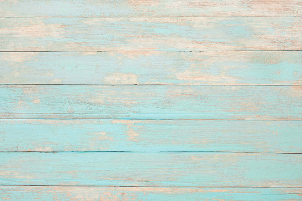 Vintage beach wood background - Old weathered wooden plank painted in turquoise blue pastel color. - Фото, зображення