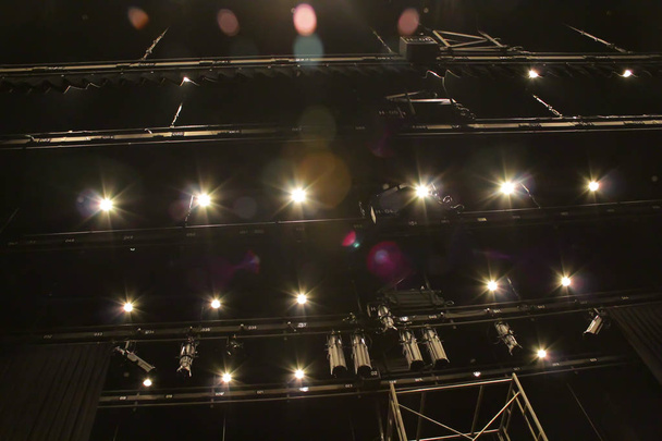 Lighting equipment and hanging bars for performances within the theater are bright for use. - Photo, Image