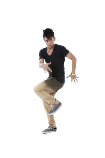 Aziatische danser op zijn dans verplaatsen - Foto, afbeelding