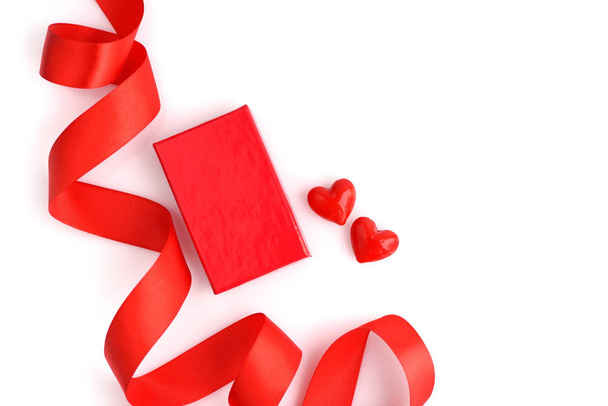 Valentines Day background. Red gift box and two glass heart on white background - Φωτογραφία, εικόνα