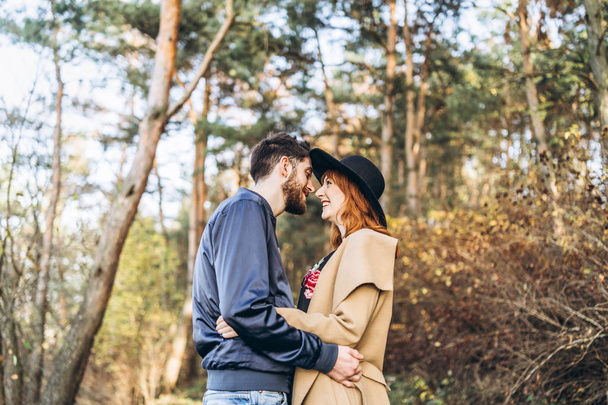 Happy young romantic couple spend time together outdoor - 写真・画像