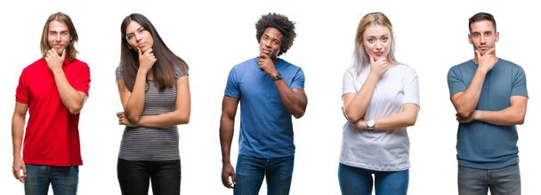 Composition of african american, hispanic and caucasian group of people over isolated white background looking confident at the camera with smile with crossed arms and hand raised on chin. Thinking positive. - Photo, Image