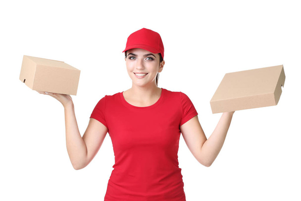 Delivery woman with cardboard boxes on white background - Valokuva, kuva